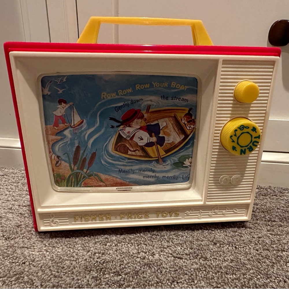Vintage fisher-price music box. London bridge is falling down and row row your b